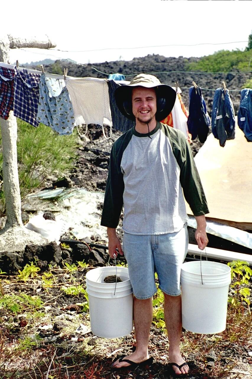 Carrying buckets by clothesline